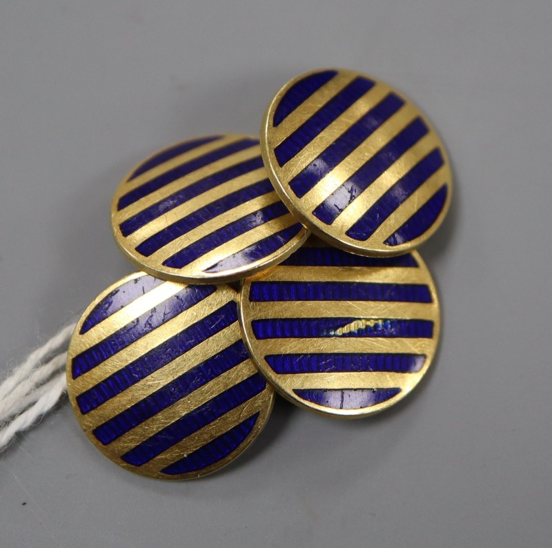 A pair of 18ct and enamel disc cufflinks, diameter 14mm, gross 8.3 grams.